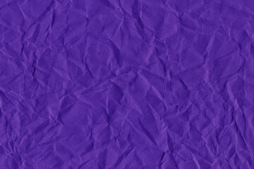 Violet vintage and old looking crumpled paper background. Retro cardboard texture. Grunge paper for drawing. Ancient book page. Present wrapping.