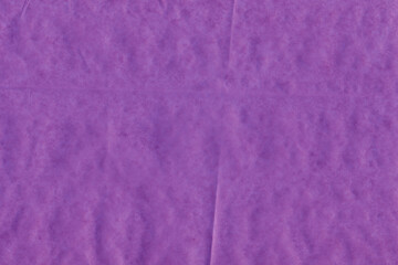 Violet vintage and old looking crumpled paper background. Retro cardboard texture. Grunge paper for drawing. Ancient book page. Present wrapping.