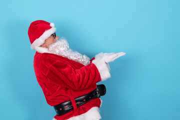 santa claus pointing isolated on background