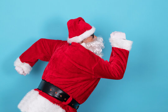 santa claus running isolated on background