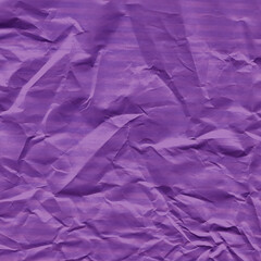 Violet vintage and old looking crumpled paper background. Retro cardboard texture. Grunge paper for drawing. Ancient book page. Present wrapping.