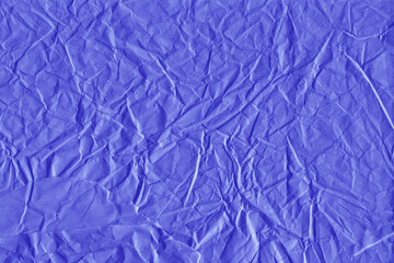 Violet vintage and old looking crumpled paper background. Retro cardboard texture. Grunge paper for drawing. Ancient book page. Present wrapping.