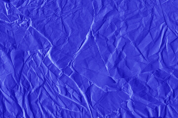 Violet vintage and old looking crumpled paper background. Retro cardboard texture. Grunge paper for drawing. Ancient book page. Present wrapping.