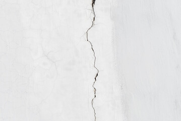 crack on white concrete wal