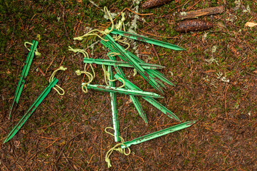 An abstraction of many pegs for a tourist tent. Pegs for a tourist tent.