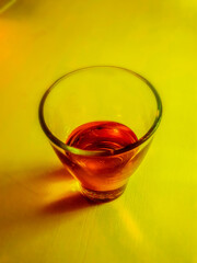 red drink in a glass on an abstract background - Lilleaker