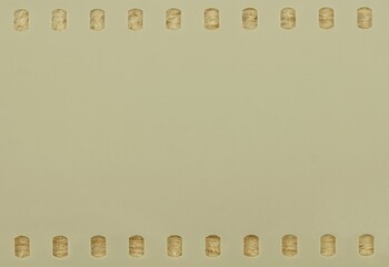 A surface film base of texture and backgrounds a cream color with perforations style.