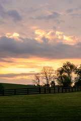 Sun Rises Over Horse Farm