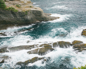 waves crashing on rocks