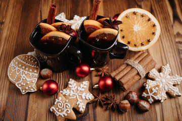 Winter still life with hot mulled wine and sweets
