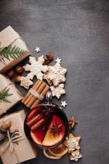 Christmas background with presents and mulled wine
