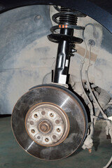 Front suspension of the car in the vertical photo