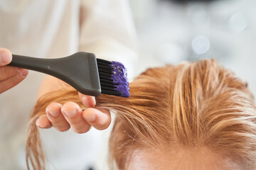 Man hands dyeing hair