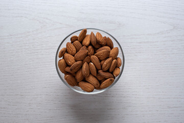 fresh almonds in a  cup