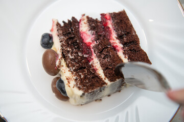 Eating sweet piece of cake