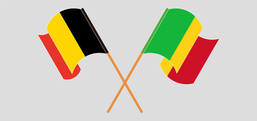 Crossed and waving flags of Mali and Belgium