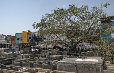 Fototapeta na wymiar Dhobi Ghat at the very south of Colaba in Mumbai is the largest open-air 