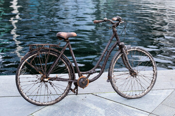 Fototapeta premium An old sunken Bicycle that was pulled out of the water