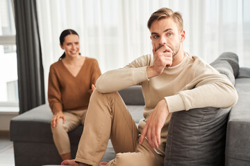 Woman gesticulating while talking to her husband