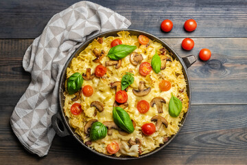 casserole  pasta with mushrooms, sausage and cheese