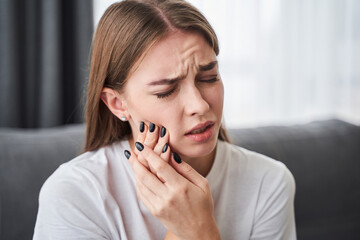 Women suffering from toothache