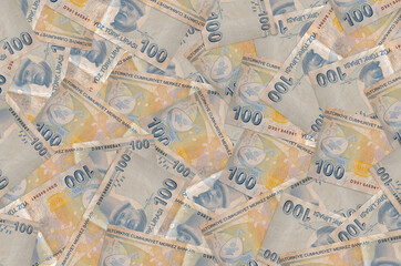 100 Turkish liras bills lies in big pile. Rich life conceptual background