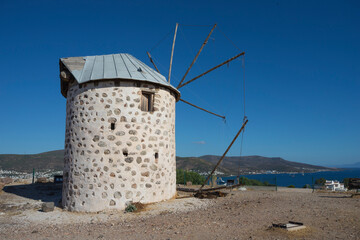 Fototapeta na wymiar Old ruined windmill in Bodrum