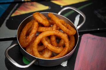 Fried onion rings with chilli sauce