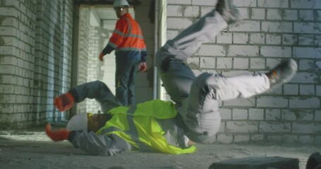 Builder saving colleague after accident