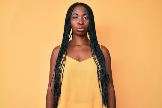 African american woman with braids wearing casual clothes depressed and worry for distress, crying angry and afraid. sad expression.