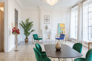 modern and very stylish interior design of large studio apartment with fashionable furniture with...