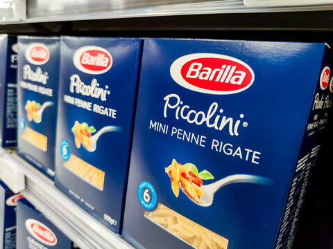 Selected collection of penne regate pasta Barilla brand display for sell in french supermarket