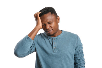 Stressed African-American man on white background