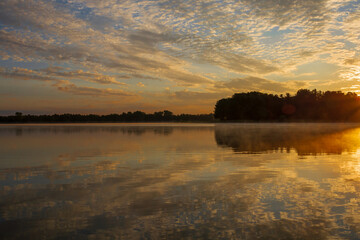 sunrise reflecting over the lake