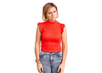 Obraz premium Young blonde woman wearing casual clothes depressed and worry for distress, crying angry and afraid. sad expression.