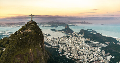 Cristo Redentor statue in Rio de Janeiro (aerial shot) during a spectacular sunset