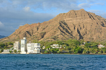 Oceanfront condos along the Gold Coast of Oahu at the base of Diamond Head Crater in Honolulu on Oahu, Hawaii.  © Ryan Tishken