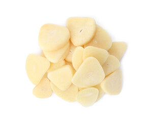 Pile of fresh sliced garlic cloves isolated on white, top view. Organic food