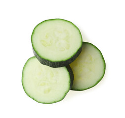 Slices of ripe zucchini on white background, top view