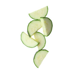 Slices of ripe zucchini on white background, top view