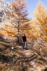 Young boy walking in the mountains