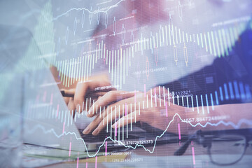 Multi exposure of woman hands typing on computer and financial graph hologram drawing. Stock market analysis concept.