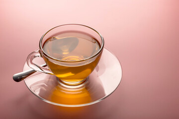 the hot teacup in transparent glass