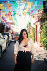 portrait of young happy woman looks in camera