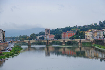 Fototapeta na wymiar Pone Vecchio (old bridge) below is Arno river. Florence, Italy