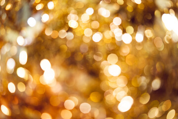 Sparkle bokeh golden light background.