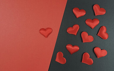 Valentines day concept. Romantic backgound, red hearts on red black background, copy space
