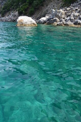 turquoise water and rocks