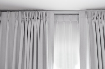 Two layers curtain with rails, installed on ceiling, translucent and blocking lights curtain - obrazy, fototapety, plakaty