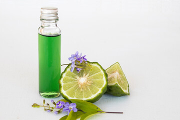 natural herbal oils from vegetarian kaffir lime local of asia smells scents aroma therapy on background white